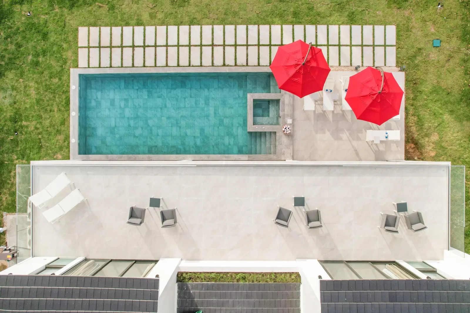 The pool and its terrace seen from above