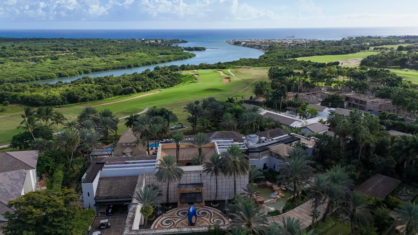From the air: the house, the golf course and the river mouth beyond