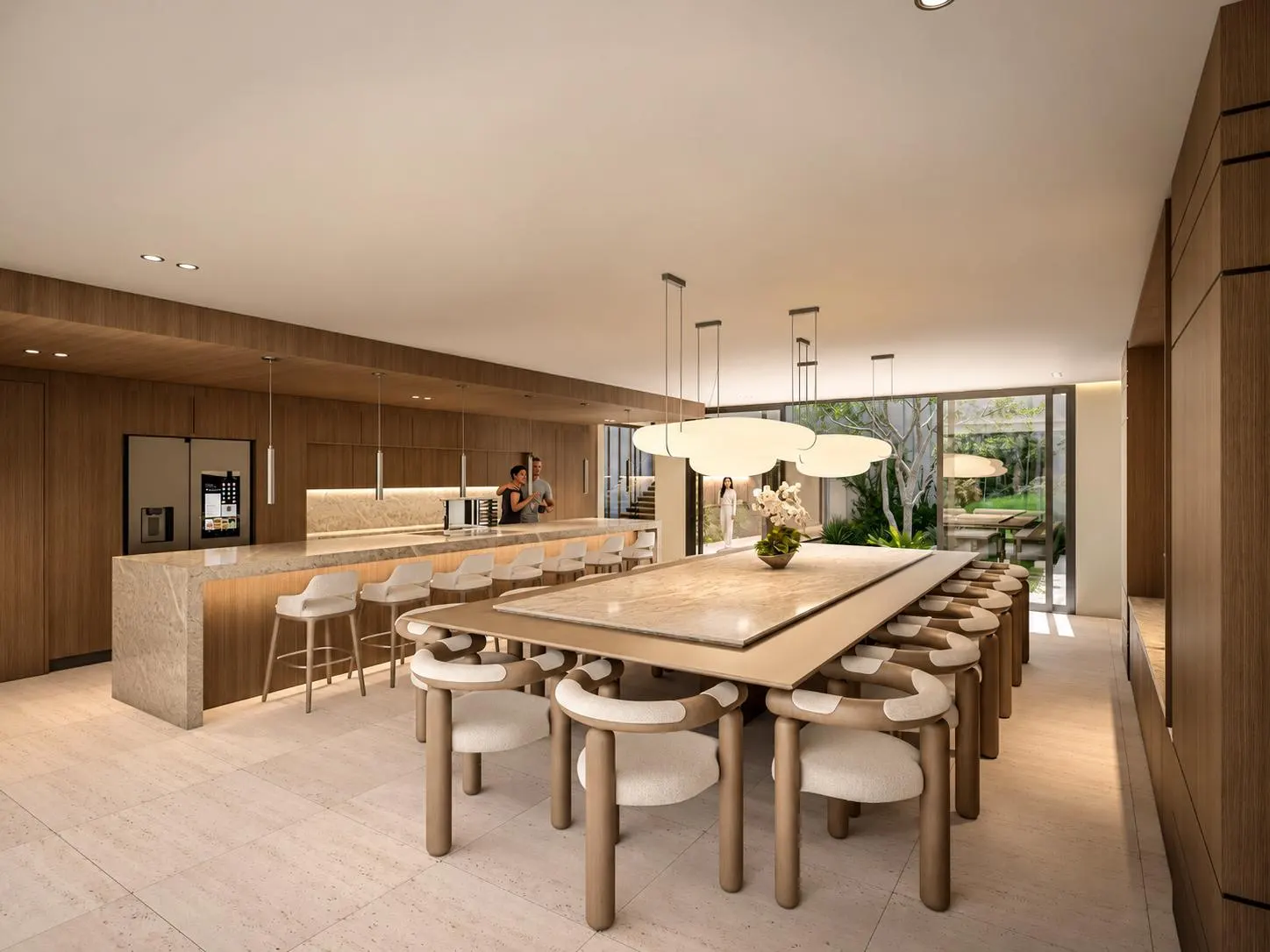The dining room and kitchen in pale stone and wood