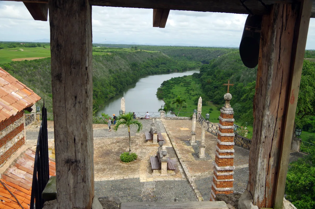 The Chavón river winding through green hills, seen from the terrace